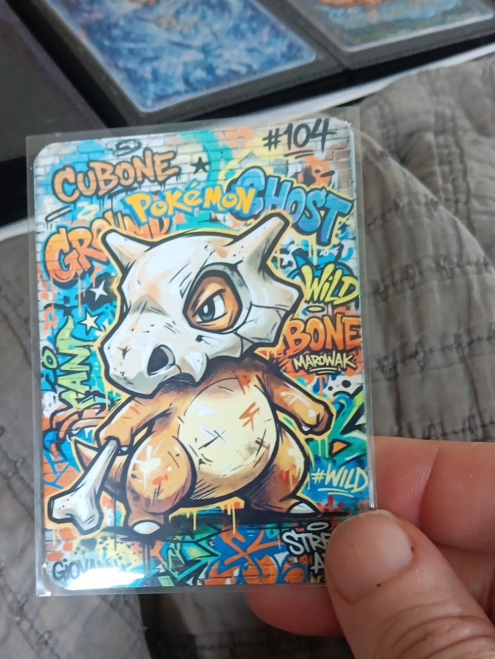 Pokemon Cubone Graffiti Card — tan, cream, blue, orange, green
